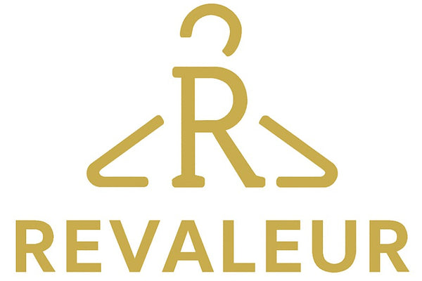 Gold 'REVALEUR' logo on a white background